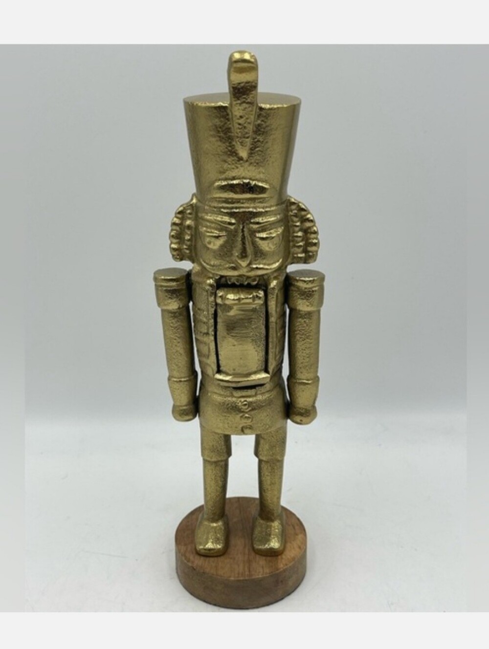 Metal Nutcracker Sculpture On Wood Pedestal Base